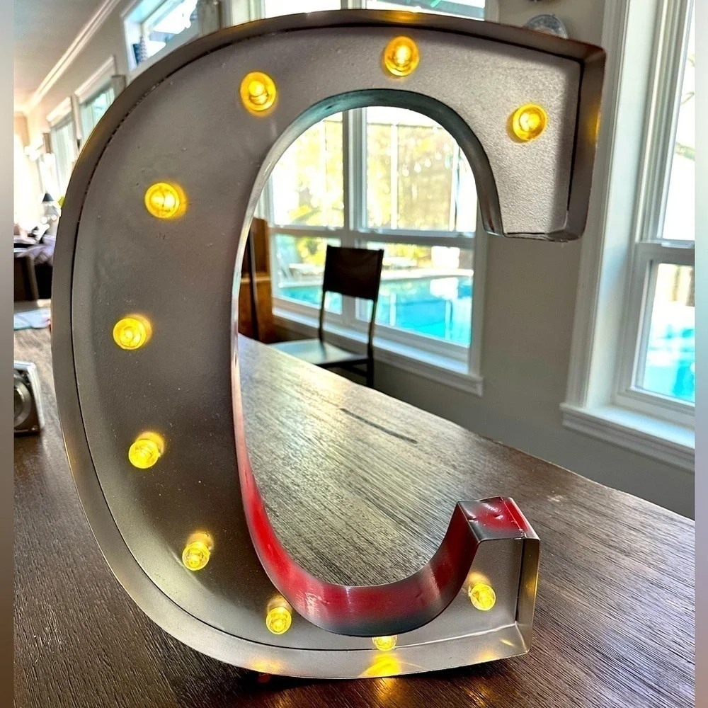Industrial, light-up, free-standing, C initial decoration